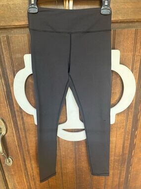Zyia Black LNT, size 2, GUC except for hole on left leg (see photo)